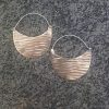 Golden textured hoop earrings